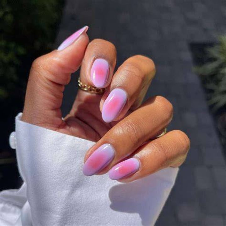Aura nails with soft diffused color cloud gradient effect in pink and purple