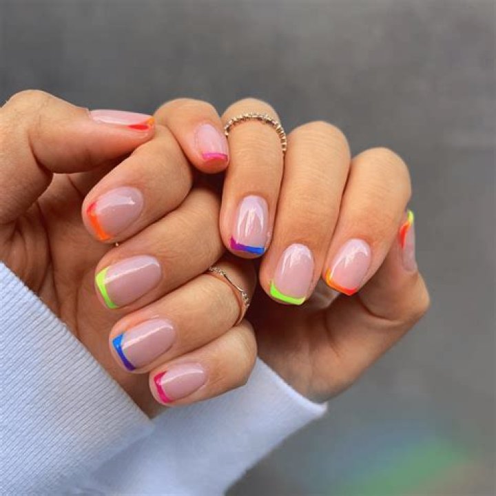 Micro French manicure with colored tips in pastel and bold shades 2026