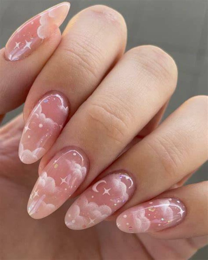 Soft pastel swirl and cloud nail art dreamy 2026